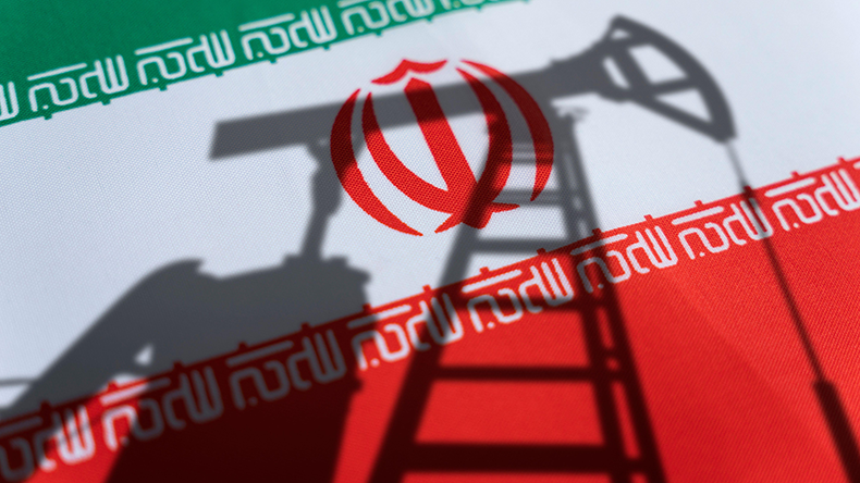 Oil rigs on the background of the Iranian flag