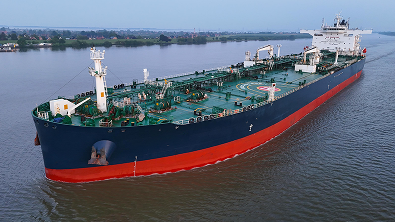 Aframax crude oil tanker on a river