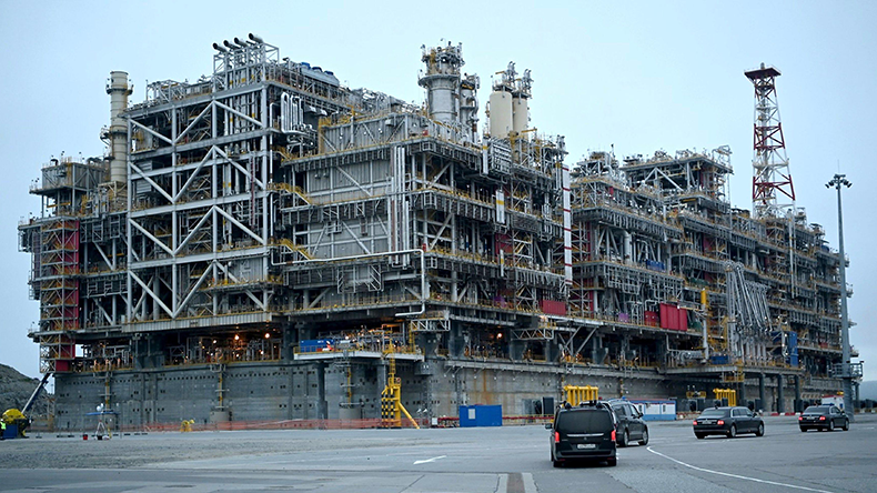 President Vladimir Putin arrives to visit a LNG plant in dry dock for departure to the Gydan peninsula for production of LNG for the European market