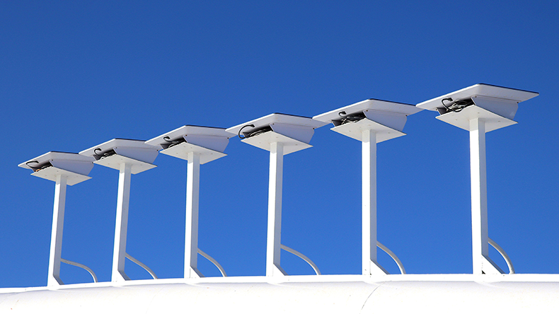 A bank of SpaceX Starlink receivers retrofitted to a cruiseship