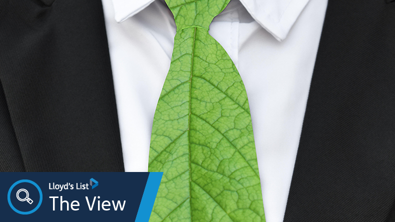 Businessman with green environmental tie