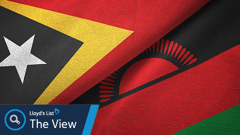 The flags of East Timor and Malawi in textile cloth