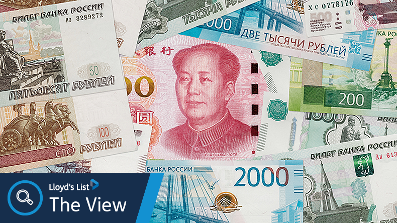 An image of Chinese yuan and Russian ruble banknotes.