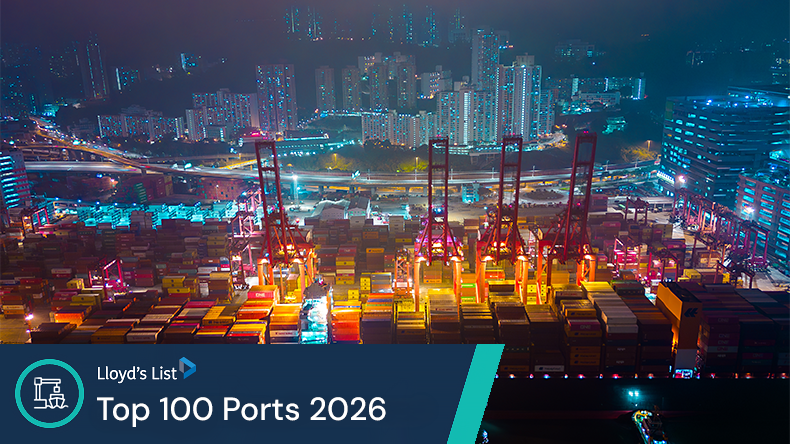 Aerial view of cranes loading containers into the ship at Hong Kong commercial port