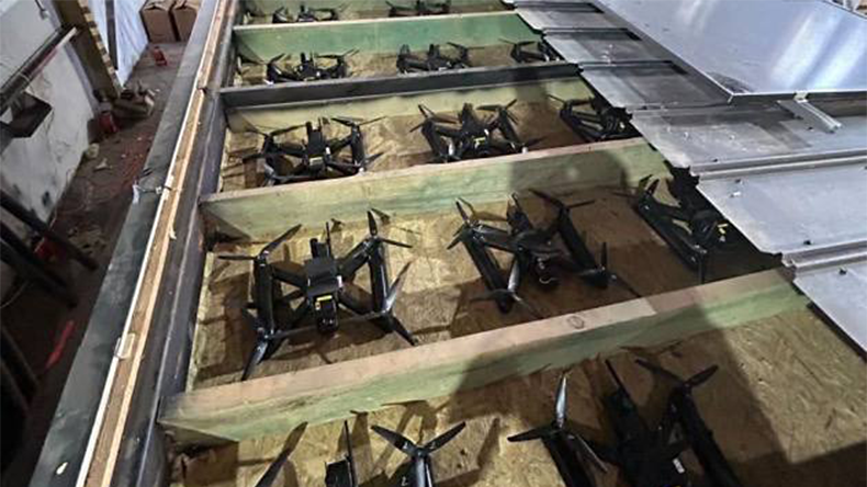 FPV drones placed in containers before being carried in trucks to launch points to attack Russian military airfields
