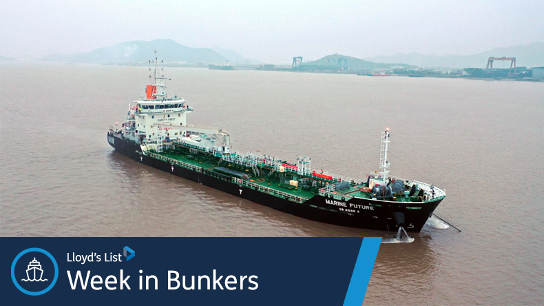 Vitol bunkering vessel on a river on a hazy day